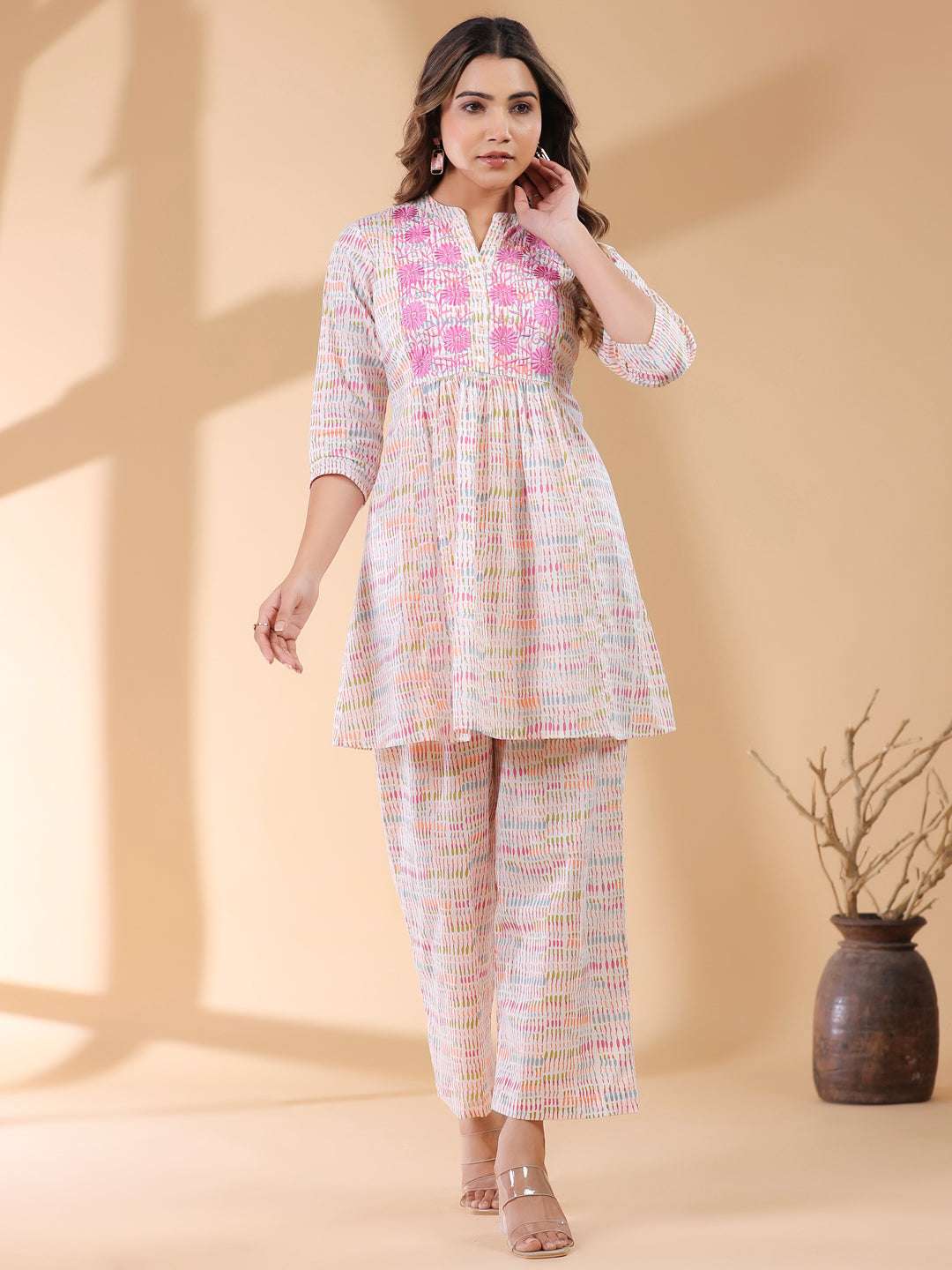 Two-piece white co-ord set – vibrant printed outfit