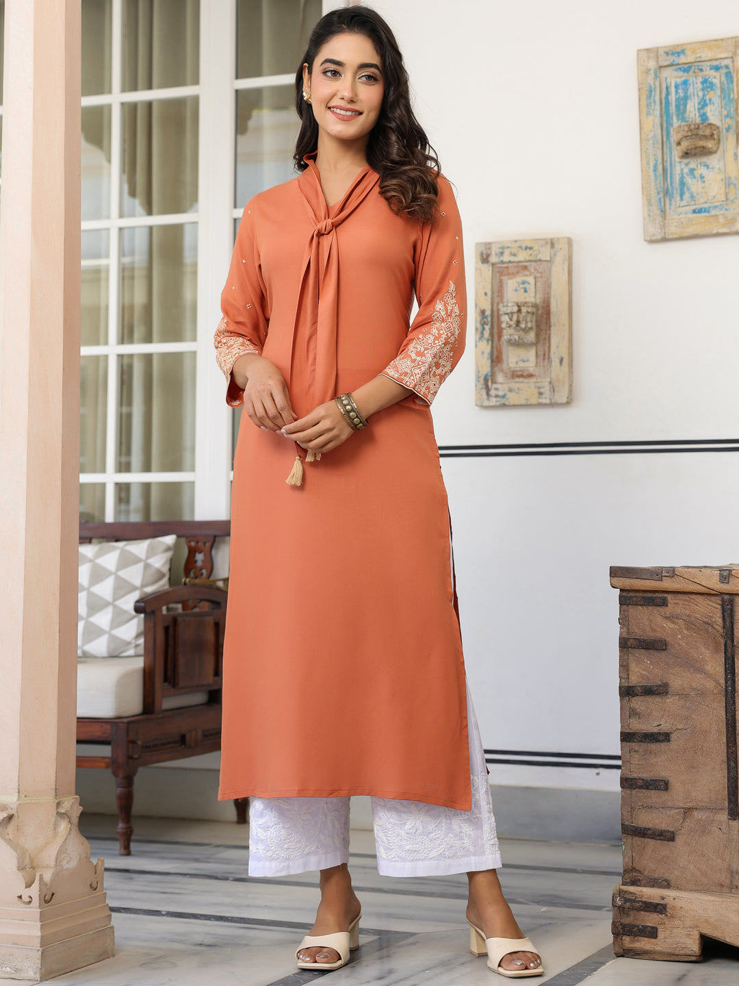 Vedika Peach Rayon Solid Kurti for Women