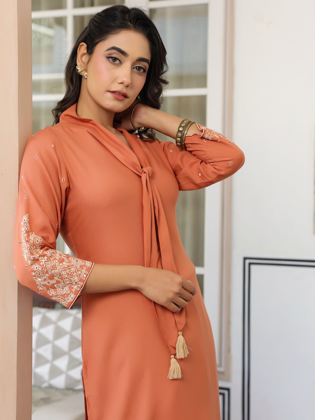 Vedika Peach Rayon Solid Kurti for Women