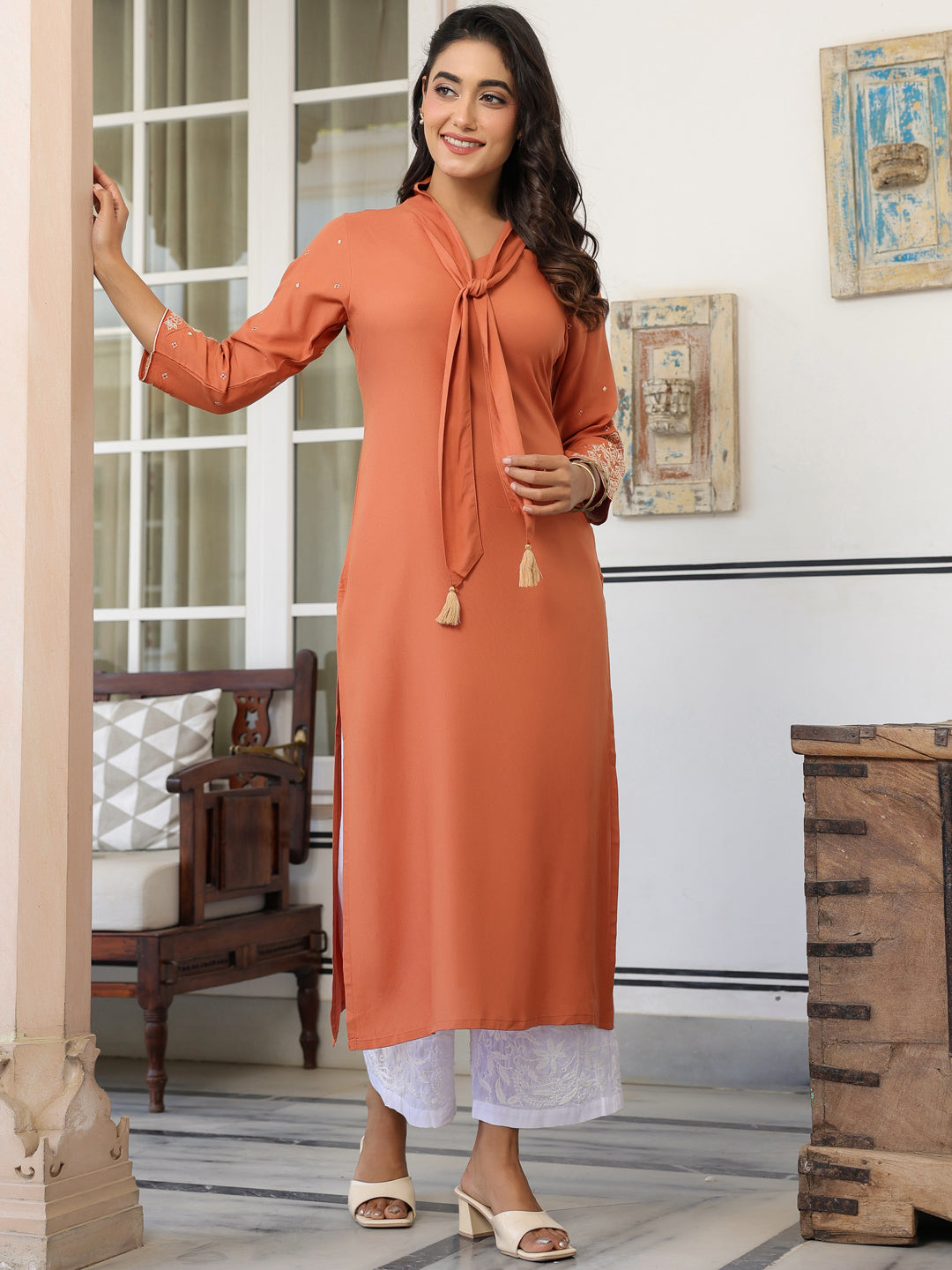 Vedika Peach Rayon Solid Kurti for Women