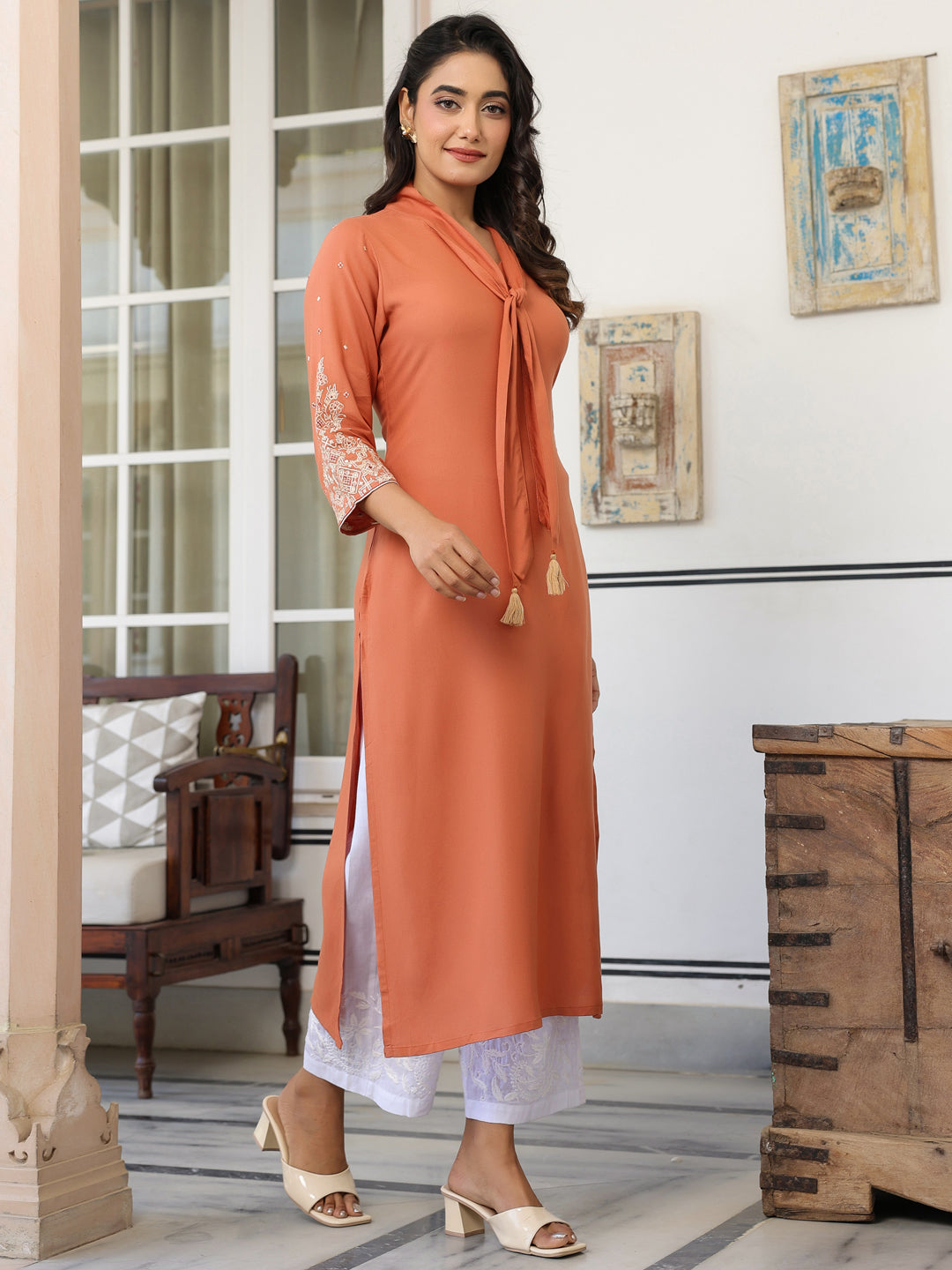 Vedika Peach Rayon Solid Kurti for Women